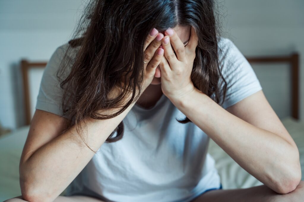 Sad, unhappy woman in depression. Stress, anxiety, tension, psychological problems. Poor mental heal