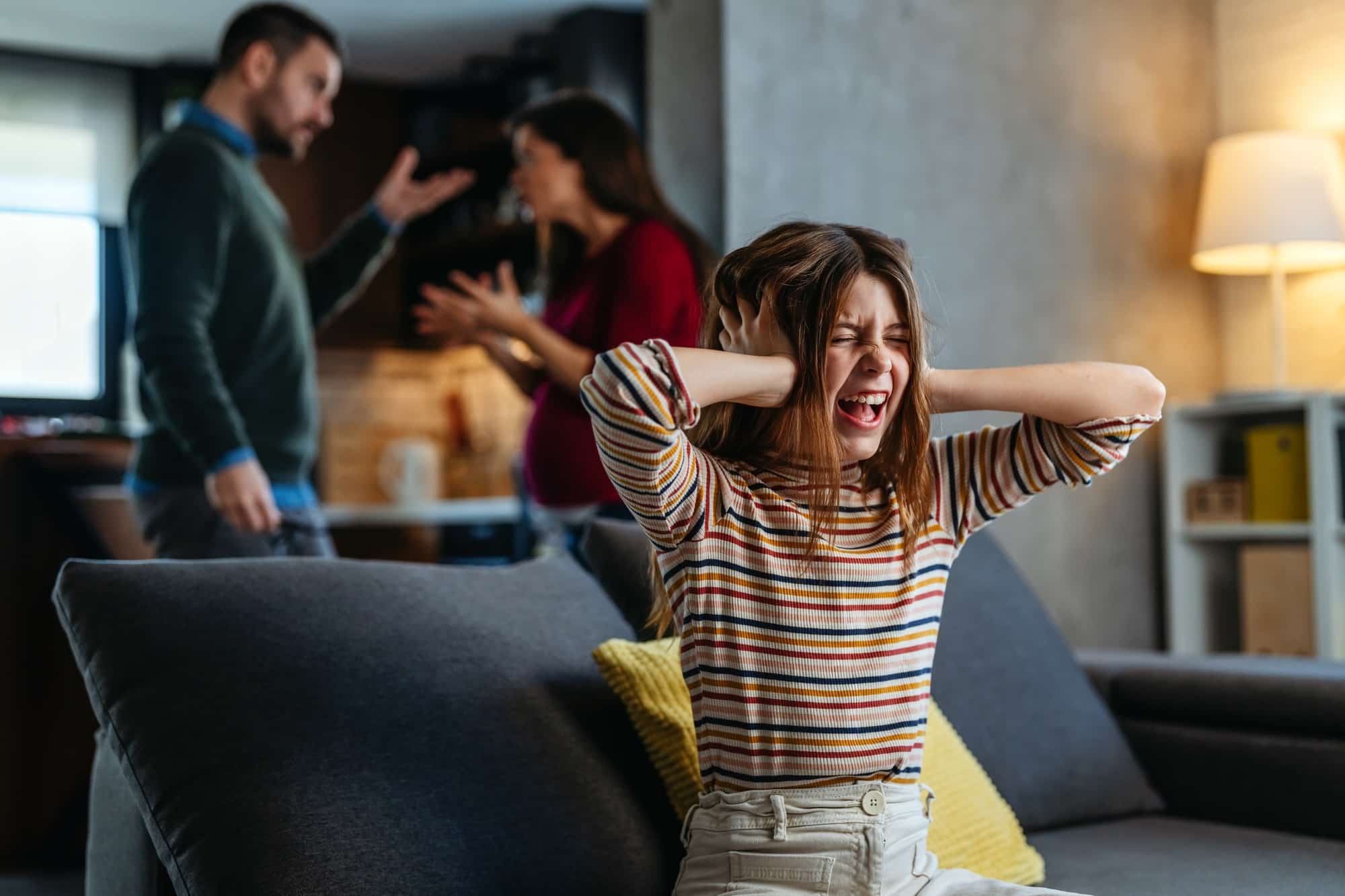 A neglected, frustrated teenager while her parents struggle with relationship problems and argue
