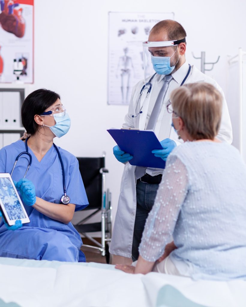 Nurse consulting with doctor Nurse consulting with doctor